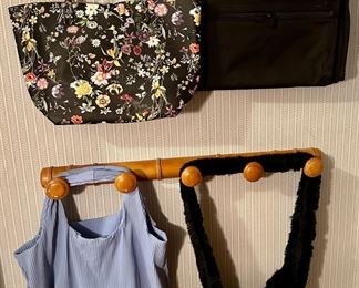 4 Large Bags: Tumi Collapsable Garment Bag, Faux Fur & More
Lot #: 111