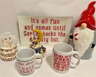 Christmas Santa Cookie Jar, Glass Tray, 2 Mugs, Snow Globe & Musical Figurine
Lot #: 42