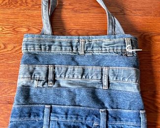 Over 15 Bags: Ralph Lauren Garment Bag, Saks 5th Avenue, Kenneth Cole, LeSportsac & More
Lot #: 110