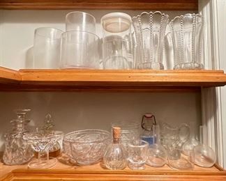 Over 30 Crystal & Glass Vases, Bottles, Cake Platters, Pitchers & Bowls, Some Vintage
Lot #: 157