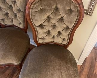 $95 	
Pair of green velvet chairs (on broken foot)									