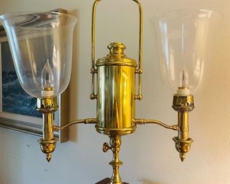 $250 	
Brass double ship lamp		
