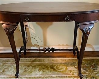 $295 	
Oval mahogany table parlor table 47Wx27Dx29T	