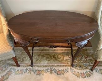 $295 	
Oval mahogany table parlor table 47Wx27Dx29T	