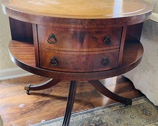 $150 	
Round inlaid wooden table 4 drawers & bookshelve 32 Round x 28T	