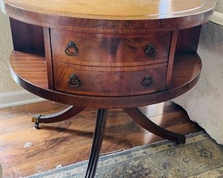 $150 	
Round inlaid wooden table 4 drawers & bookshelve 32 Round x 28T	