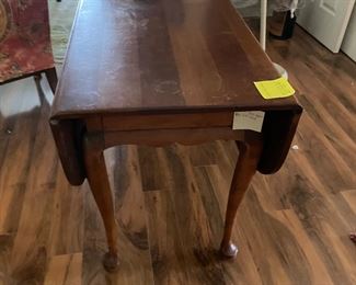$250 	
Drop leaf table 48Lx23Dx28T - Opens to 73"""									
damages on top 	