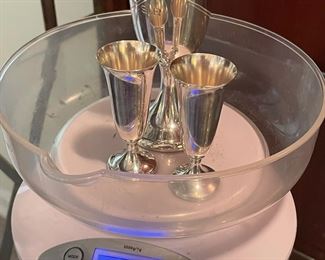 $110 	
One wine cup sterling & 2 shot cups 119 gr. 									