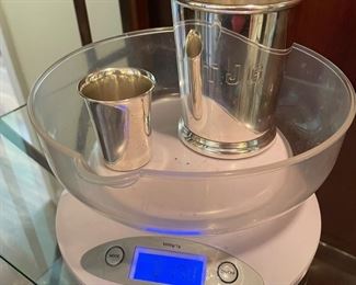 $95 	
Sterling Mint julep cup and shot cup as a lot 									
