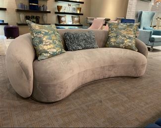 Elegant Curved Grey Sofa- $500                                                        Retail Price: 1,499
