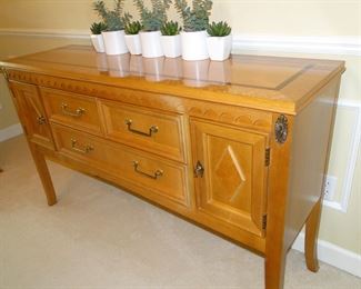 Hand varved, wood inlaid buffet