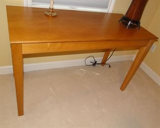 Clean sleek elegant design.  Desk, or kitchen table your choice, you know you cannot go wrong with this piece