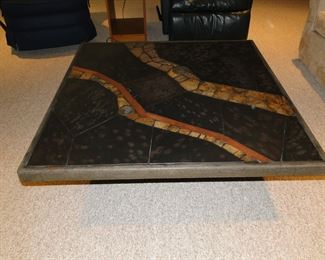 One of a kind find with this large square coffee table,