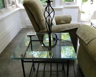 Large, metal and glass topped table.  Looks like we have a trio of matching tables
