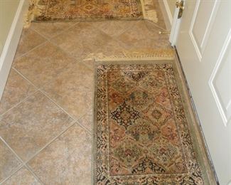 Two smaller entry, area rugs