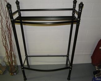 Metal shelving unit with curved shelves