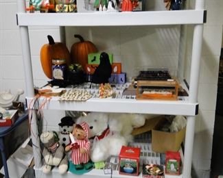 Nice selection of Halloween and Christmas items, along with plastic storage shelving
