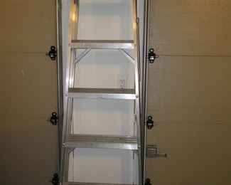 Another, larger aluminum extension ladder