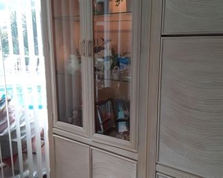 3 Units available, All different. Use one or all 3 as a wall unit. Lights in 2 Glass doors on top, storage on bottom