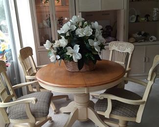 Farmhouse Chic. Cream color with Wood Tabletop. 4 chairs with Casters