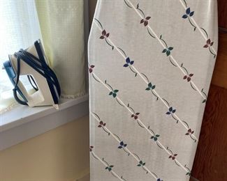 nice ironing board and iron 