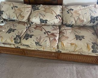 Vintage rattan sofa, still sits well but could use a bit of face lift on the fabric 