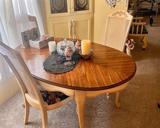 Beautiful caned back dining set with one leaf