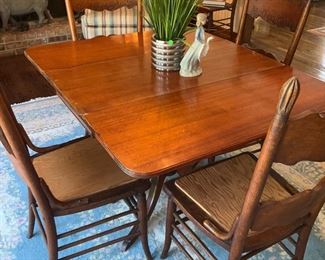 Drop leaf table,  6 matching chairs