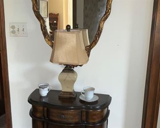 Hall table, gold mirror, lamp