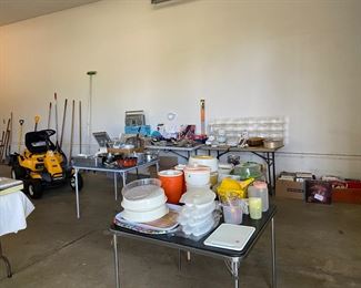 Lots of households, linens, books, vintage records in the garage. That Cub Cadet is ready for a test run.