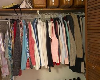 The clothes and shoes in this house are like new, clean and pressed! Check out those Samsonite hard case suitcases.