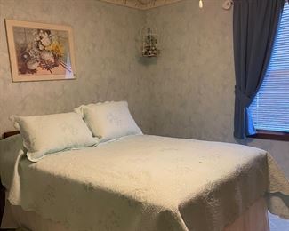 This comfy bed has an awesome MCM wood headboard that is hidden by the pillows. Will get a better picture this week.