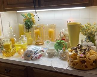Misc glassware, vases and candles.......and in the corner is one large cheesy candle!! 😂