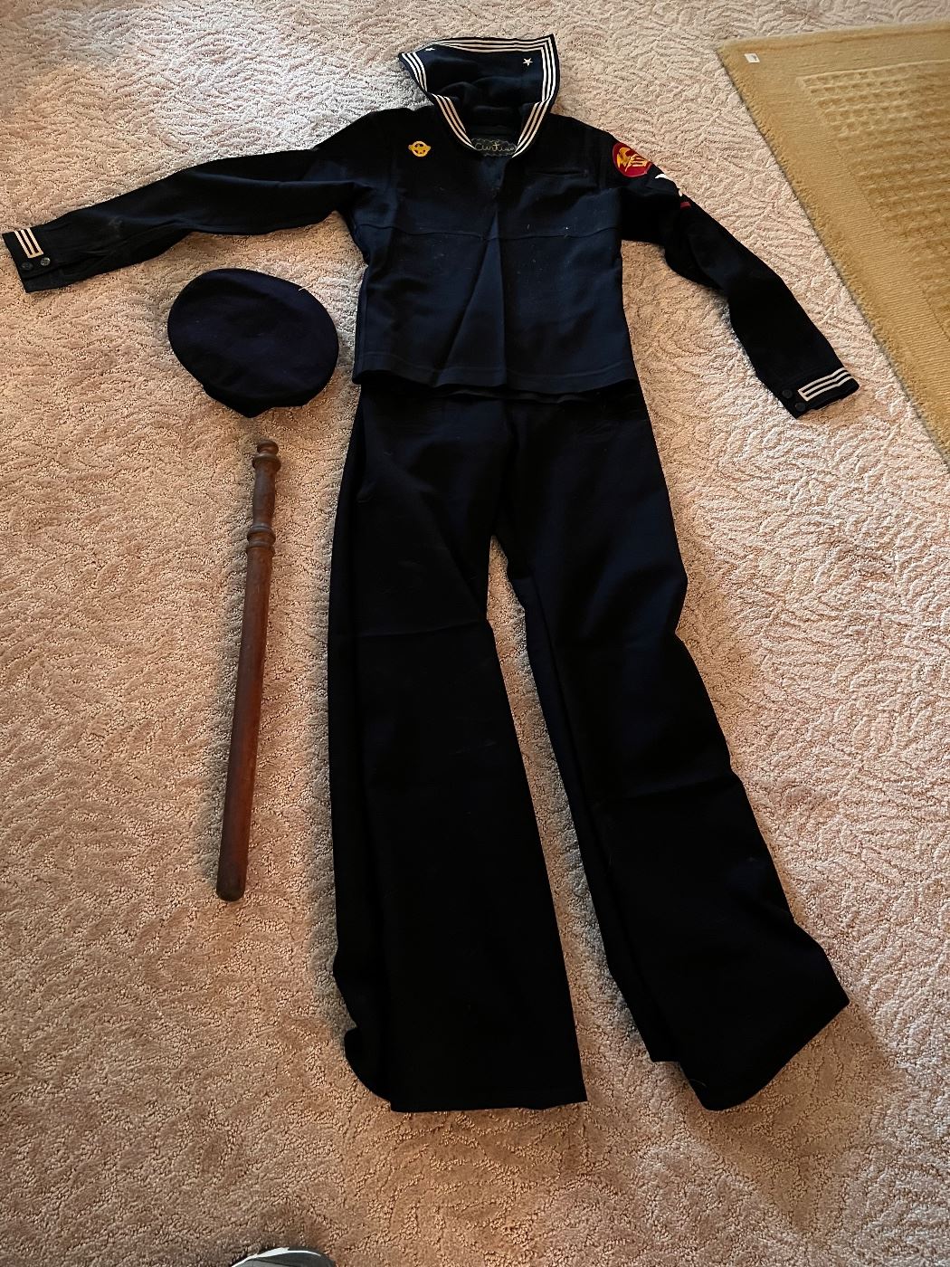 WWII Navy Sailor Crackerjack Uniform along with old photo of entire Navy crew and a bully stick