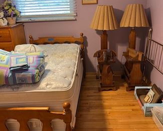 Twin size bed with mattress/box springs
End tables with lamps