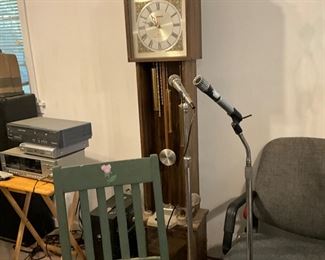Grandfather clock, microphones on stands, Chairs, electronics