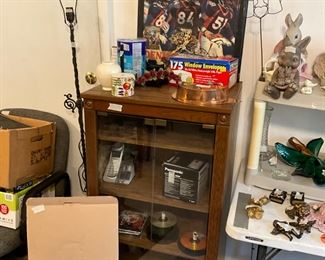 Cabinet, Super Bowl picture, CD’s, miscellaneous 