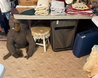 Linens, stuffed animal, stool, linens