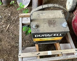 Behind the house under the canopy