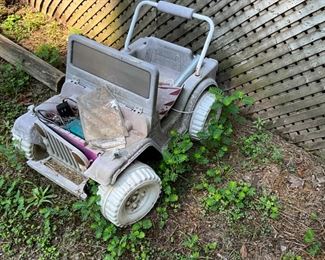 Behind the house under the canopy