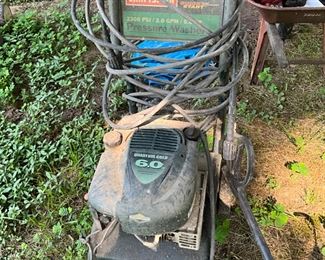 Behind the house under the canopy - pressure washer