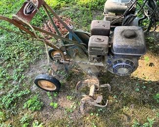 Behind the house under the canopy - Tiller