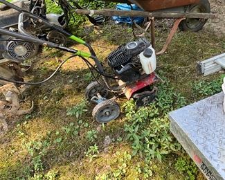 Behind the house under the canopy - Tiller