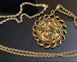 Vintage 14k yellow gold pendant with 5 Emerald gemstones and a 14k yellow gold 24" chain.