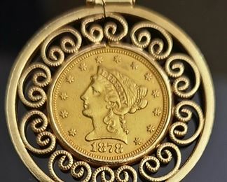 1878 Liberty $2 1/2 gold coin set in a 14k yellow gold setting.