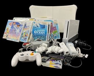 Nintendo Wii Console PLUS Accessories, The Wii Fit Board, and Various Games
