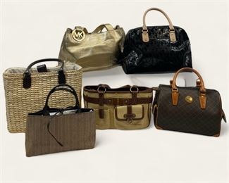 vMetallic Gold Michael Kors leather tote. The bag measures 15 inches wide, by 5 inches deep, by 10 inches high. Black Michael Kors signature MK handbag. Genuine Italian �Rioni� Signature Bowler Boston Bag. Cream and brown Borghese raffia tote bag. Brown and tan handbag with multiple pockets and built in wallet. Estee Lauder brown and tan herringbone tote.
