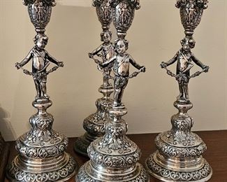 Set of 4 German figural silver candle holders