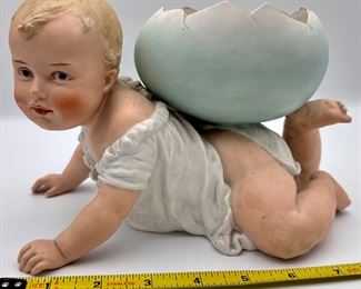 Antique Gebrüder Heubach Bisque Porcelain Piano Baby w/ Broken Egg Shell on back. Not in perfect condition.	8.5"w x 6"h x 5"w