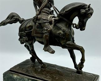 This is a Bronze of Medieval Knight on horseback.  His sword is missing and the Pommel is bent.  Solid Marble Base, very heavy.